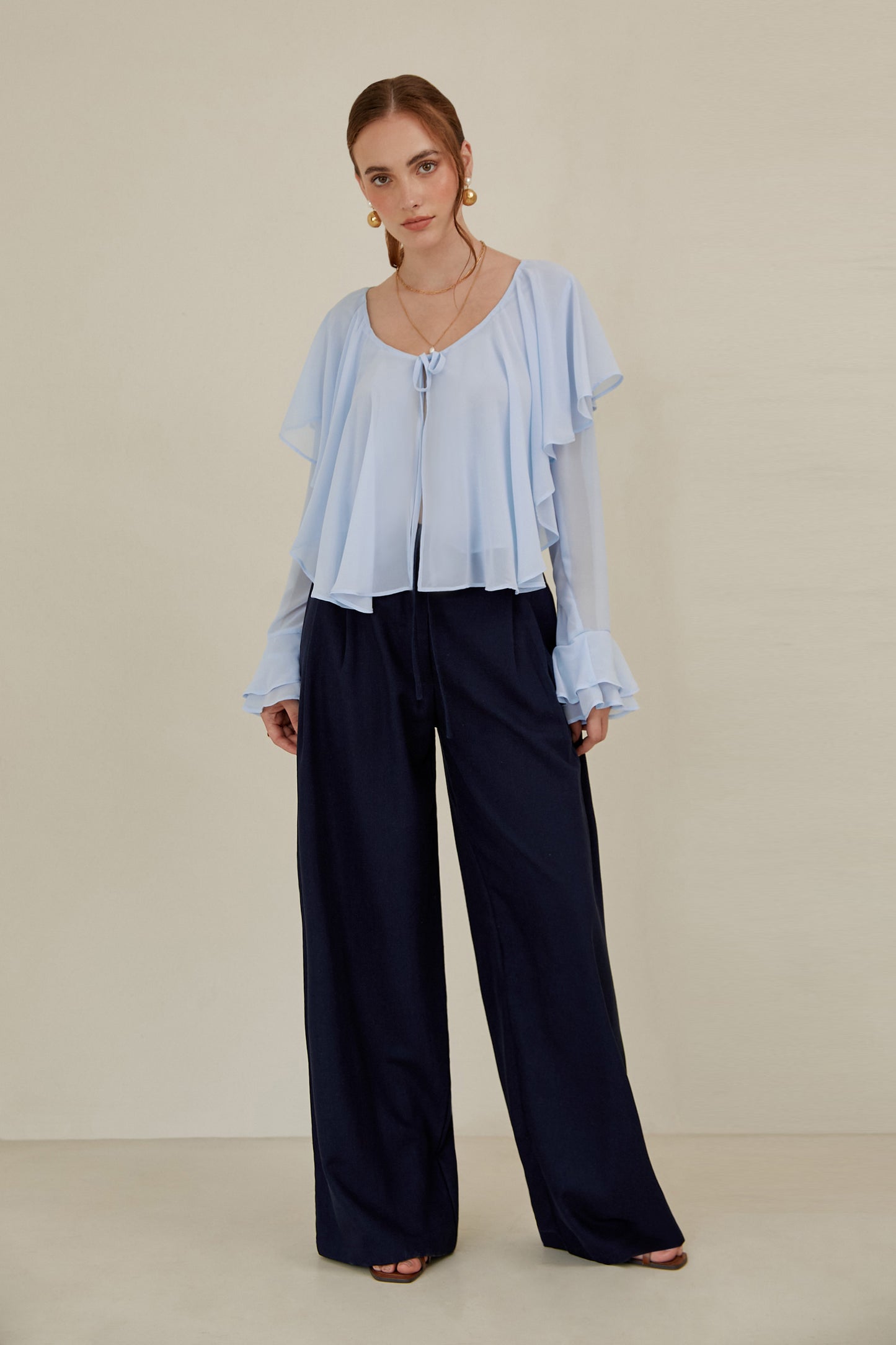 Blusa con volantes - Celeste